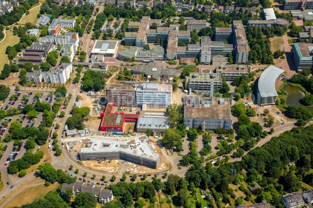 Düsseldorf from the bird's eye view: Construction site for the new building of Forschungsgebaeude of Lebenswissenschaften on Universitaetsstrasse in Duesseldorf in the state North Rhine-Westphalia, Germany