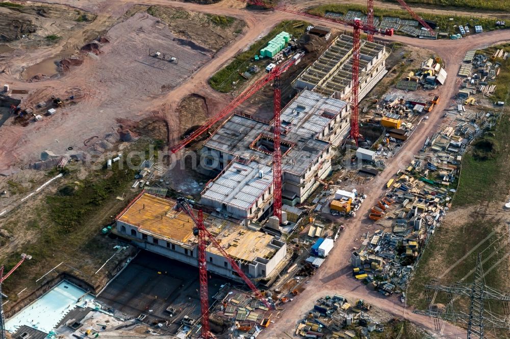 Rust from the bird's eye view: Construction for the new building of the spa and swimming pool at the swimming pool of Recreation Wasserpark RULANTICA - Europa-Park Rust in Rust in the state Baden-Wuerttemberg, Germany