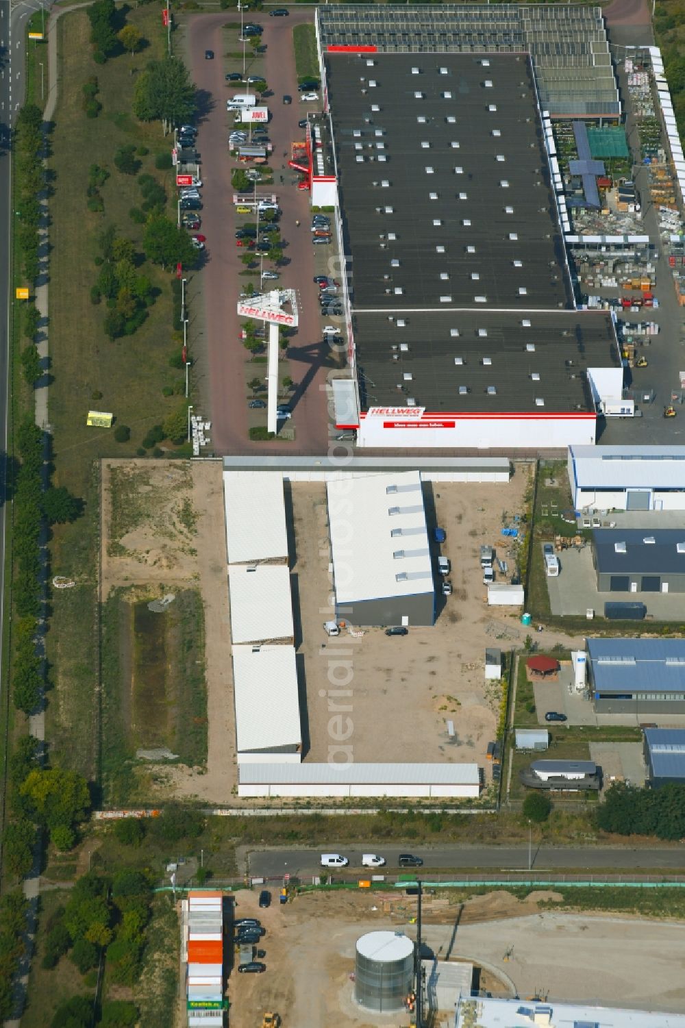 Hoppegarten from the bird's eye view: Construction site for the new construction of the garage area Selfstorage - Garagenhof Hoppegarten in Hoppegarten in the state of Brandenburg, Germany