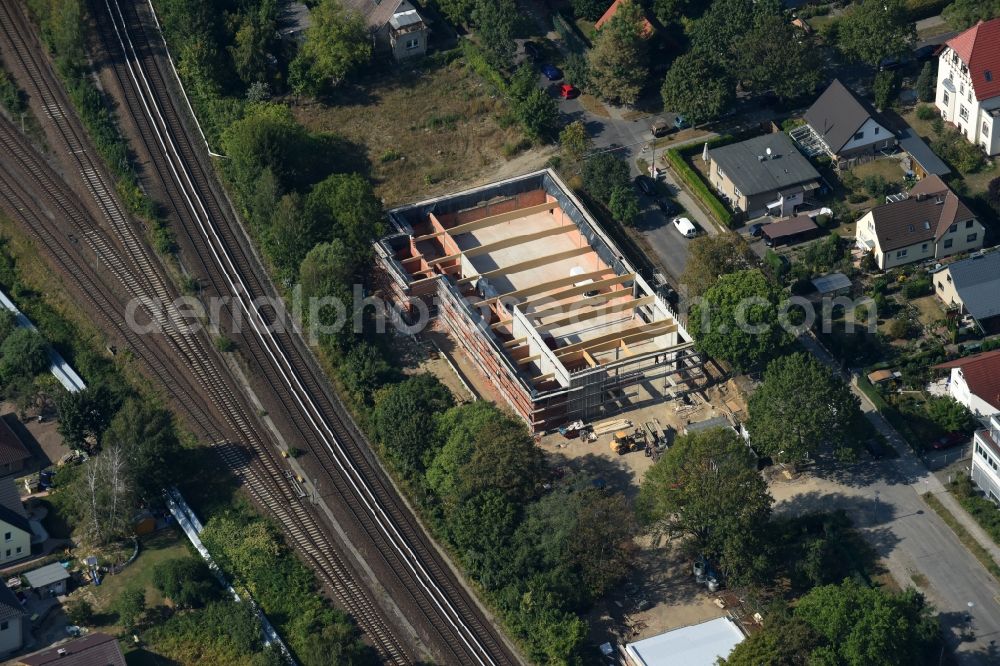 Berlin from the bird's eye view: Construction site for the new building eines Garagengebaeudes in der Kulmseestrasse in Berlin