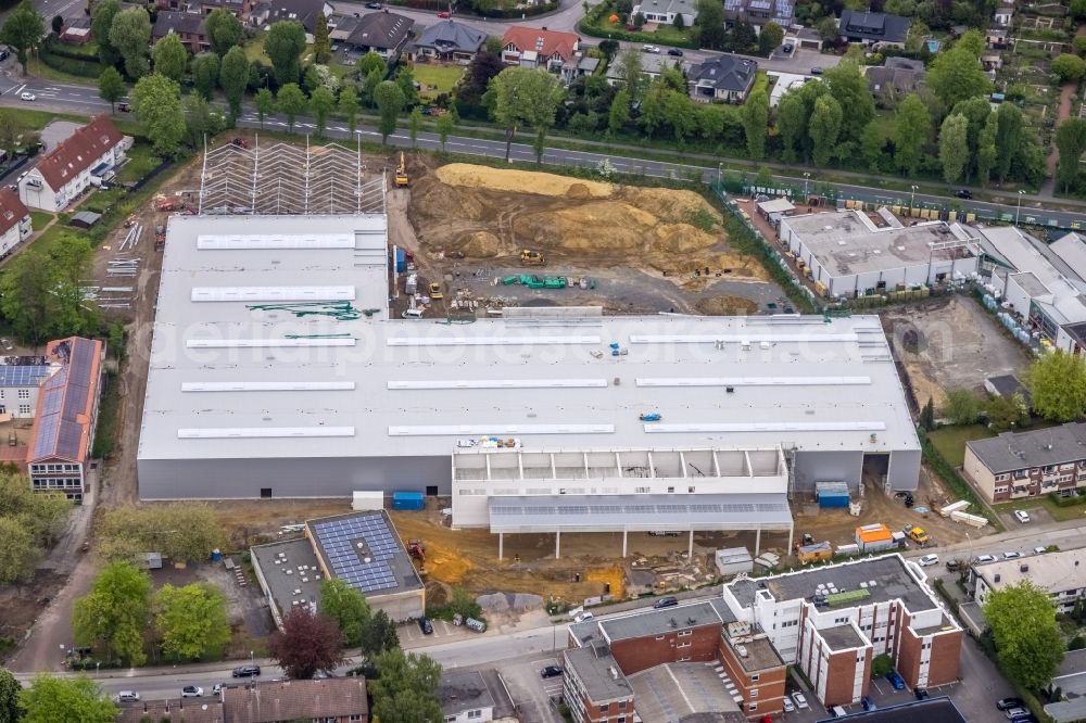 Gladbeck from the bird's eye view: Construction site for new construction building of the construction market on the grounds of the formerly sports ground between Konrad-Adenauer-Allee and Krusenkamp in Gladbeck at Ruhrgebiet in the state North Rhine-Westphalia, Germany