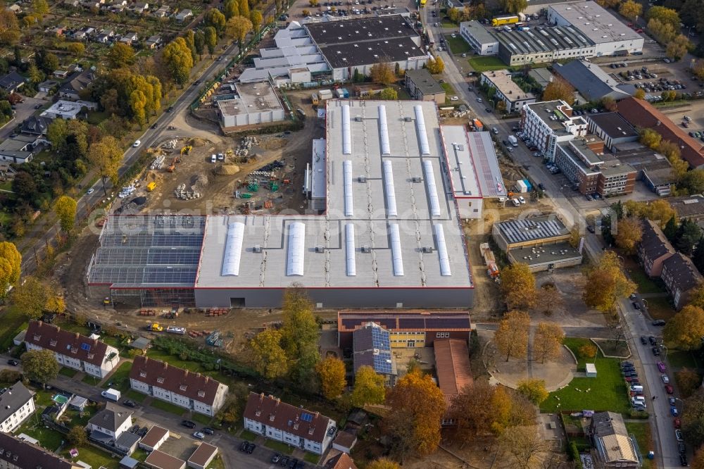 Gladbeck from the bird's eye view: Construction site for new construction building of the construction market on the grounds of the formerly sports ground between Konrad-Adenauer-Allee and Krusenkamp in Gladbeck at Ruhrgebiet in the state North Rhine-Westphalia, Germany