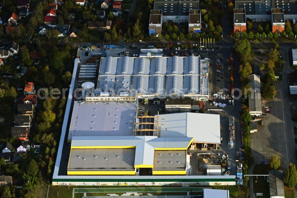 Berlin from above - Construction site for new construction building of the construction market on Landsberger Strasse in the district Mahlsdorf in Berlin, Germany