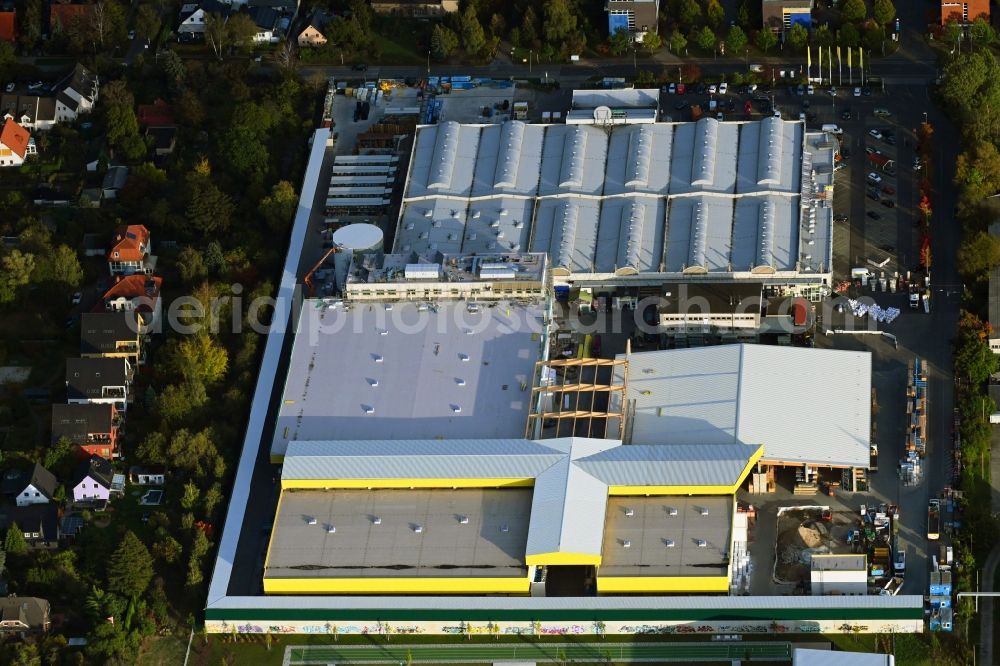 Berlin from the bird's eye view: Construction site for new construction building of the construction market on Landsberger Strasse in the district Mahlsdorf in Berlin, Germany