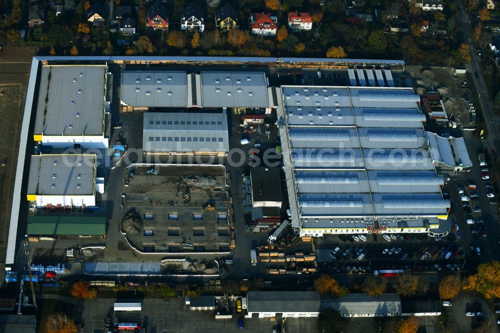 Berlin from above - Construction site for new construction building of the construction market on Landsberger Strasse in the district Mahlsdorf in Berlin, Germany