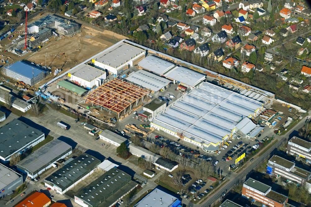 Berlin from the bird's eye view: Construction site for new construction building of the construction market on Landsberger Strasse in the district Mahlsdorf in Berlin, Germany