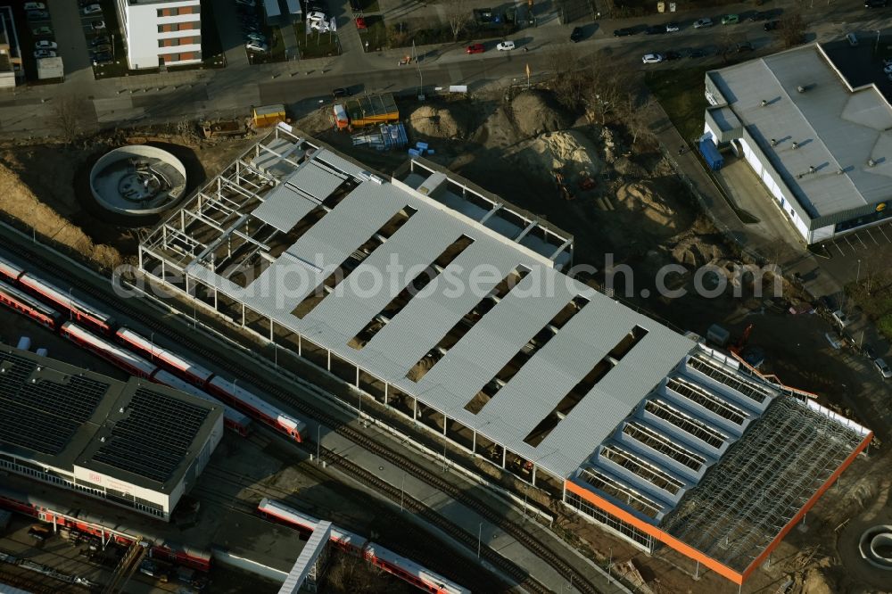 Berlin from above - Construction site for new construction building of the construction market of OBI GmbH & Co. Deutschland KG an der Buchberger Strasse im Stadtteil Lichtenberg in Berlin in Germany