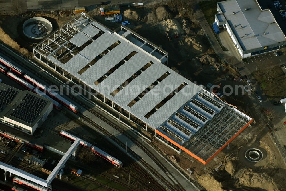 Berlin from the bird's eye view: Construction site for new construction building of the construction market of OBI GmbH & Co. Deutschland KG an der Buchberger Strasse im Stadtteil Lichtenberg in Berlin in Germany