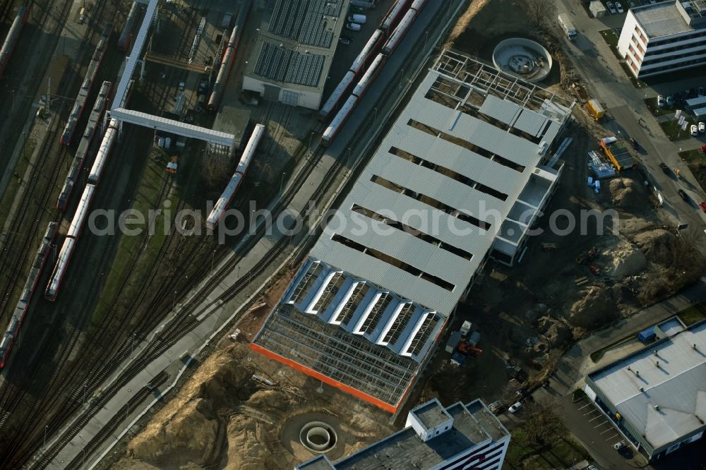 Berlin from above - Construction site for new construction building of the construction market of OBI GmbH & Co. Deutschland KG an der Buchberger Strasse im Stadtteil Lichtenberg in Berlin in Germany