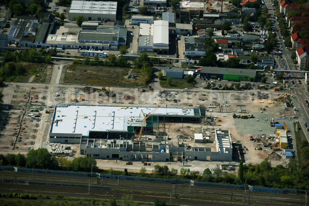 Halle (Saale) from the bird's eye view: Construction site for new construction building of the construction market between Dieselstrasse and Zeppelinstrasse in Halle (Saale) in the state Saxony-Anhalt, Germany