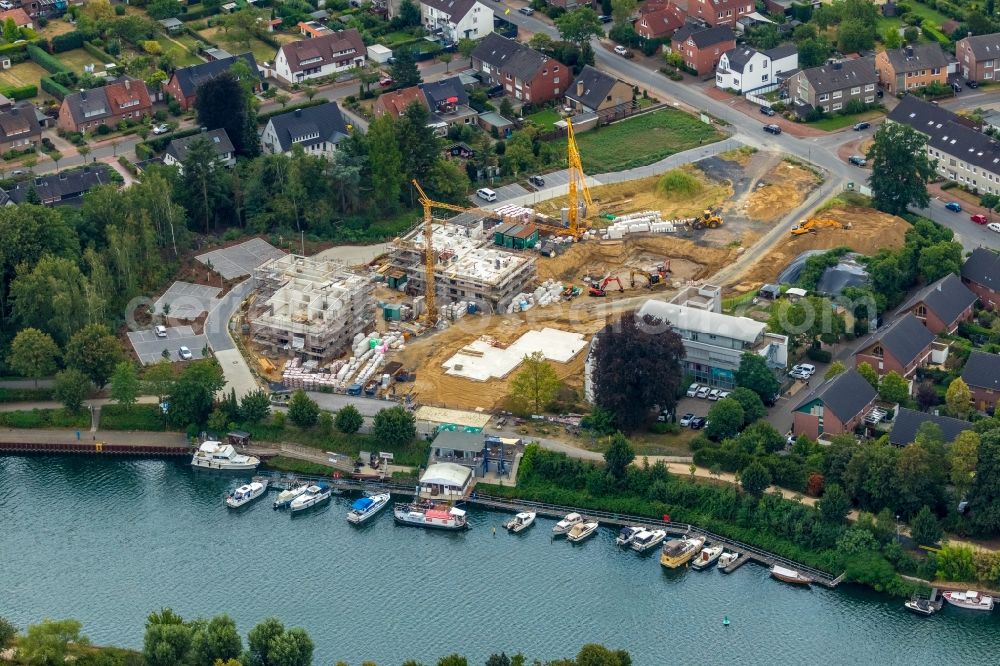 Aerial photograph Dorsten - Construction site for the new construction of a building complex of the Caritas Association for the deanery Dorsten e.V. in Dorsten in the state of North Rhine-Westphalia, Germany