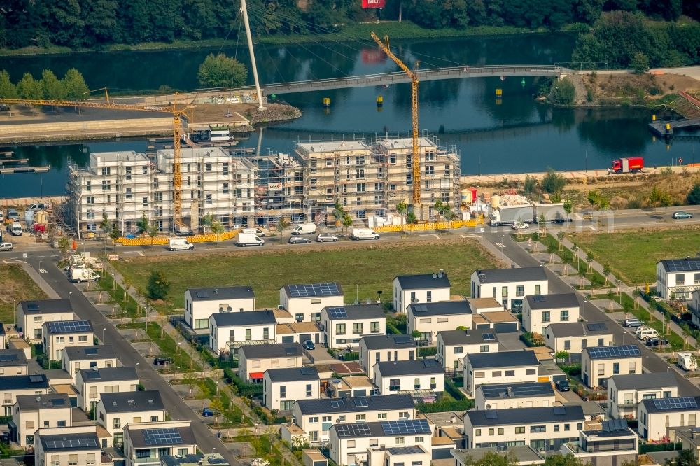 Aerial photograph Gelsenkirchen - Construction site for the new building eines Gebaeudekomplex of Hofschroeer Projektbau GmbH & Co. KG on Johannes-Rau-Allee in Gelsenkirchen in the state North Rhine-Westphalia, Germany