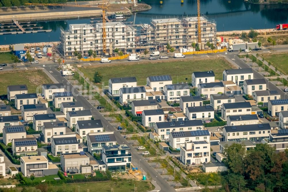 Gelsenkirchen from the bird's eye view: Construction site for the new building eines Gebaeudekomplex of Hofschroeer Projektbau GmbH & Co. KG on Johannes-Rau-Allee in Gelsenkirchen in the state North Rhine-Westphalia, Germany