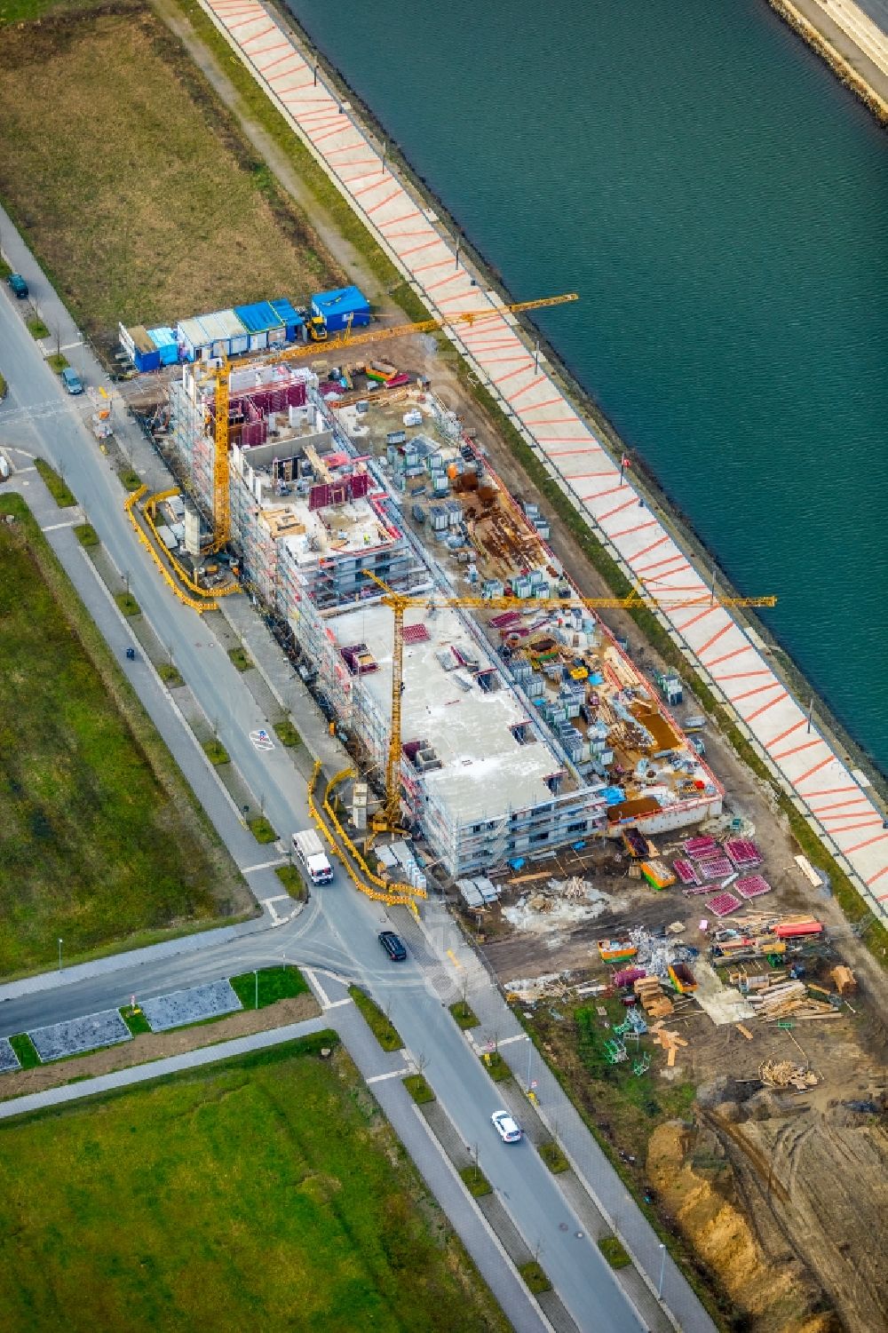 Gelsenkirchen from above - Construction site for the new building eines Gebaeudekomplex of Hofschroeer Projektbau GmbH & Co. KG on Johannes-Rau-Allee in Gelsenkirchen in the state North Rhine-Westphalia, Germany