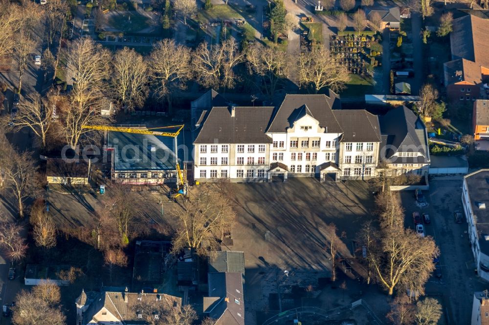 Aerial photograph Gelsenkirchen - Construction site for the construction of a new building complex on the school grounds of the Open Day School in Gelsenkirchen in the federal state of North Rhine-Westphalia, Germany