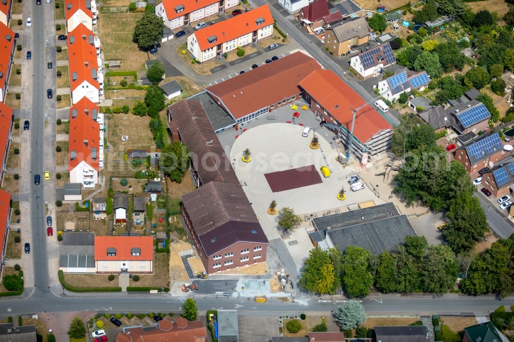 Aerial photograph Werne - Construction site for the construction of a new building complex on the school grounds of the Uhlandschule in Werne in the federal state of North Rhine-Westphalia, Germany