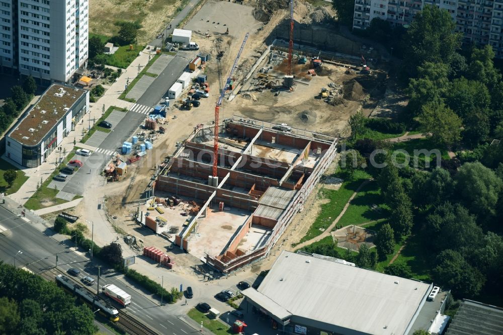 Berlin from above - New construction of the building complex of the shopping center Am Anger on Allee of Kosmonauten - Baerensteinstrasse in the district Marzahn in Berlin, Germany