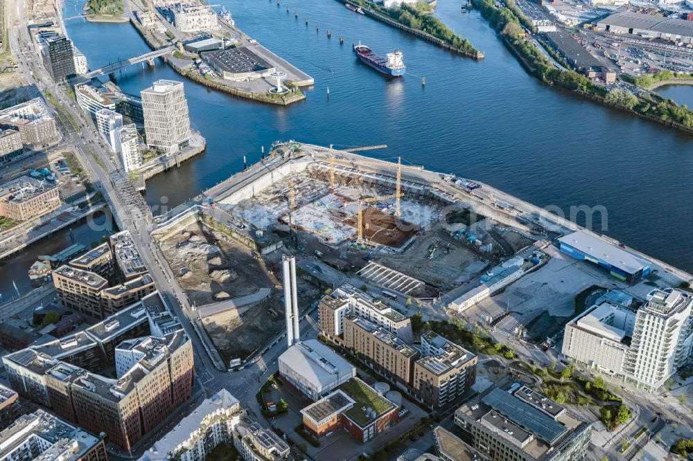 Aerial image Hamburg - New construction of the building complex of the shopping center Bau for the Erweiterung of Ueberseequartiers on Chicagokai - Osakaallee in the district Hafencity in Hamburg, Germany