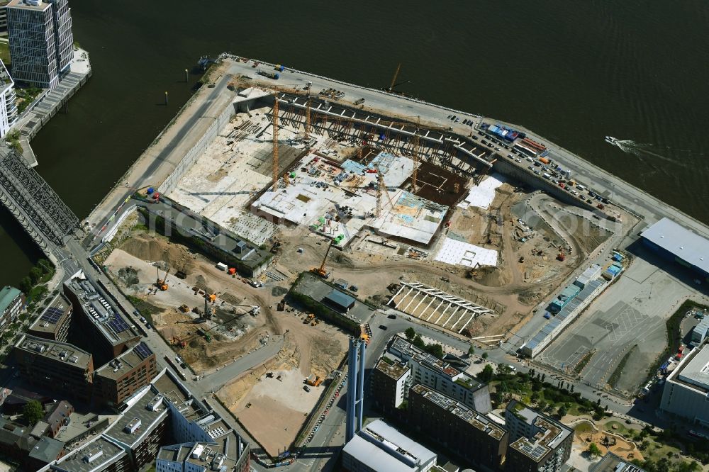 Aerial image Hamburg - New construction of the building complex of the shopping center Bau for the Erweiterung of Ueberseequartiers on Chicagokai - Osakaallee in the district Hafencity in Hamburg, Germany