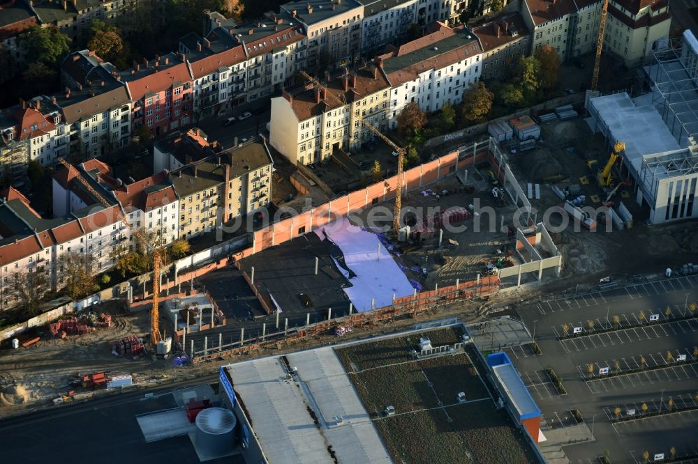 Aerial image Berlin - Construction site for the new building complex of the shopping center at Brueckenstrasse in the district of Schoeneweide in Berlin