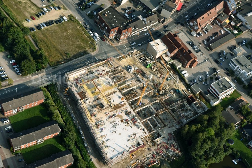 Cloppenburg from above - Construction site for the new building complex of the shopping center Carre Cloppenburg by the GENOS Carre Cloppenburg GmbH, designed by Grieshop, Hamza Architekten in Cloppenburg, Lower Saxony