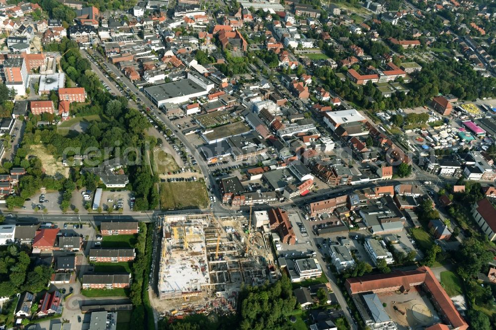 Aerial photograph Cloppenburg - Construction site for the new building complex of the shopping center Carre Cloppenburg by the GENOS Carre Cloppenburg GmbH, designed by Grieshop, Hamza Architekten in Cloppenburg, Lower Saxony