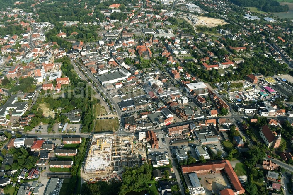 Cloppenburg from above - Construction site for the new building complex of the shopping center Carre Cloppenburg by the GENOS Carre Cloppenburg GmbH, designed by Grieshop, Hamza Architekten in Cloppenburg, Lower Saxony