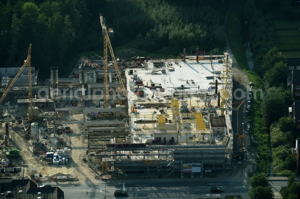 Aerial image Cloppenburg - Construction site for the new building complex of the shopping center Carre Cloppenburg by the GENOS Carre Cloppenburg GmbH, designed by Grieshop, Hamza Architekten in Cloppenburg, Lower Saxony