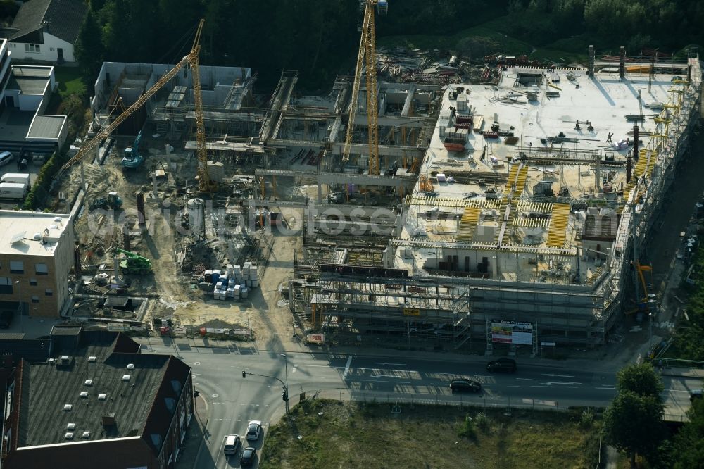 Aerial photograph Cloppenburg - Construction site for the new building complex of the shopping center Carre Cloppenburg by the GENOS Carre Cloppenburg GmbH, designed by Grieshop, Hamza Architekten in Cloppenburg, Lower Saxony