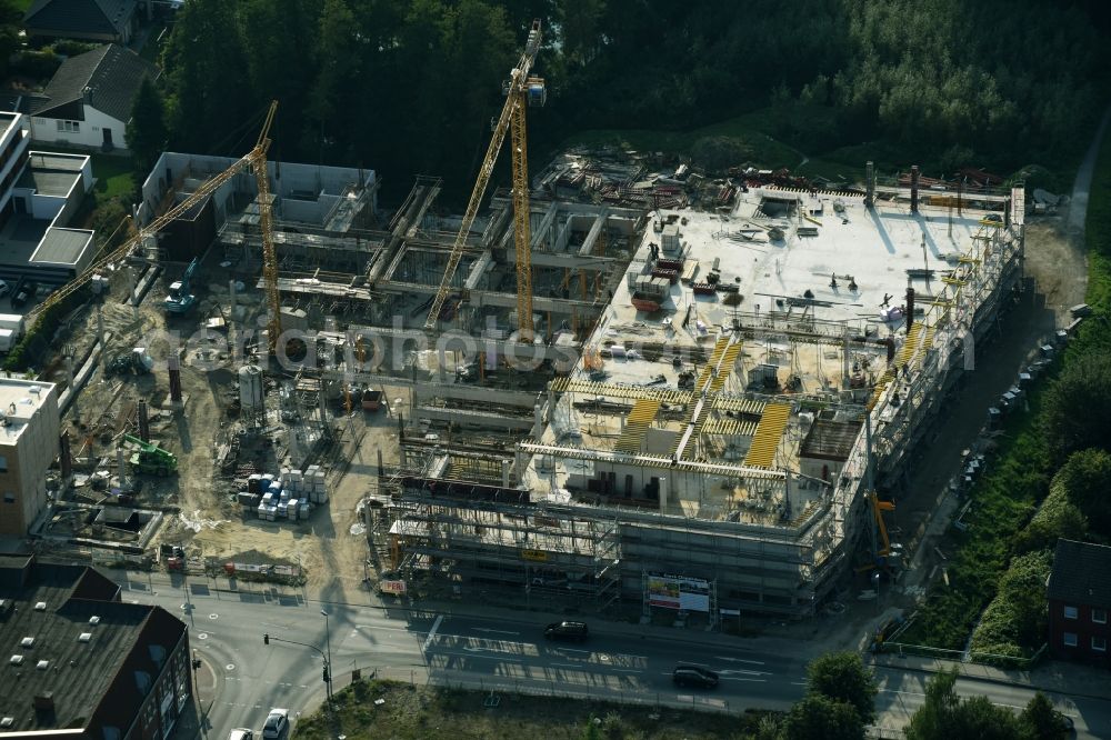 Cloppenburg from above - Construction site for the new building complex of the shopping center Carre Cloppenburg by the GENOS Carre Cloppenburg GmbH, designed by Grieshop, Hamza Architekten in Cloppenburg, Lower Saxony