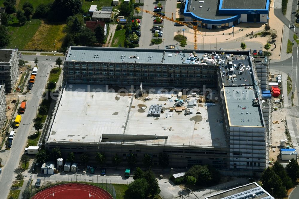 Aerial image Schönefeld - New construction of the building complex of the shopping centeron Hans-Grade-Allee corner Rudower Chaussee in Schoenefeld in the state Brandenburg, Germany