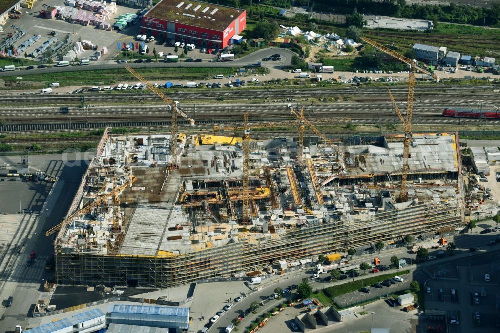 Berlin from above - New construction of the building complex of the shopping center East Side Mall of Freo Group on Tamara-Danz-Strasse on Anschutz - Areal in the district Bezirk Friedrichshain-Kreuzberg in Berlin, Germany