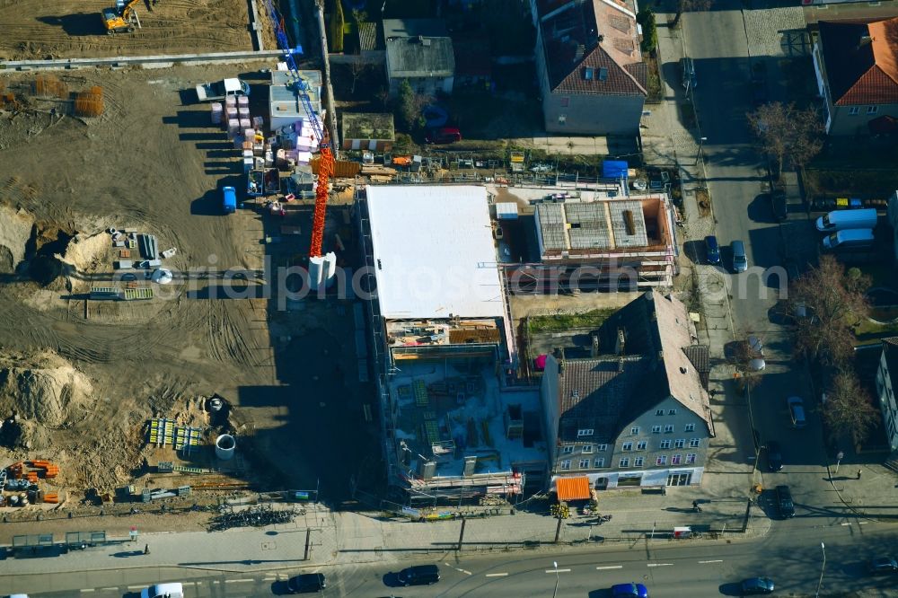 Berlin from above - New construction of the building complex of the shopping center on Hoenower Strasse in the district Mahlsdorf in Berlin, Germany