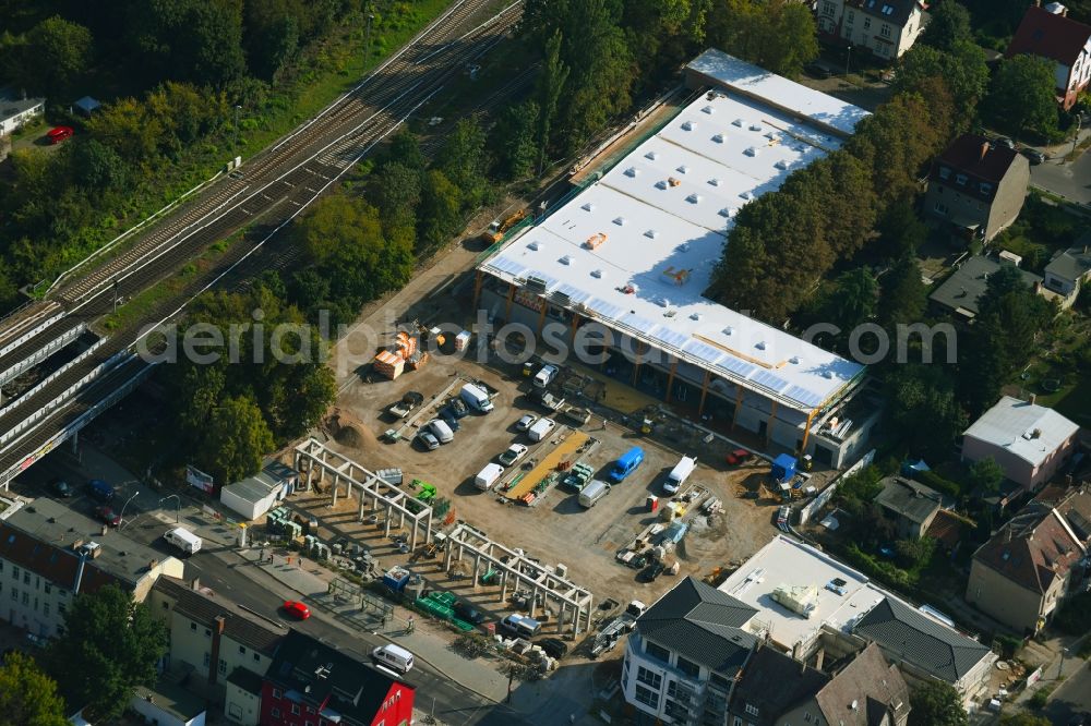 Aerial image Berlin - New construction of the building complex of the shopping center on Hoenower Strasse in the district Mahlsdorf in Berlin, Germany