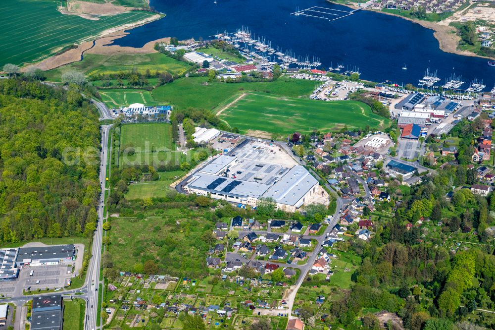 Kappeln from above - New construction of the building complex of the shopping center on street Wassermuehlenstrasse in Kappeln in the state Schleswig-Holstein, Germany