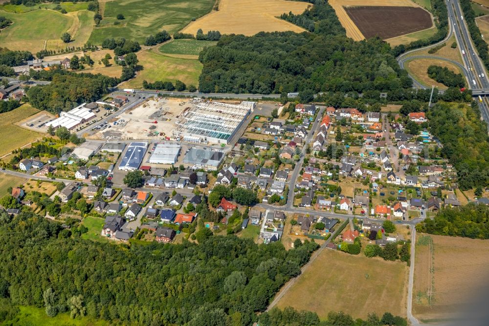 Bergkamen from the bird's eye view: New construction of the building complex of the shopping center KAUFLAND between Ostenhellweg and Am Roemerlager in the district Ruenthe in Bergkamen in the state North Rhine-Westphalia, Germany