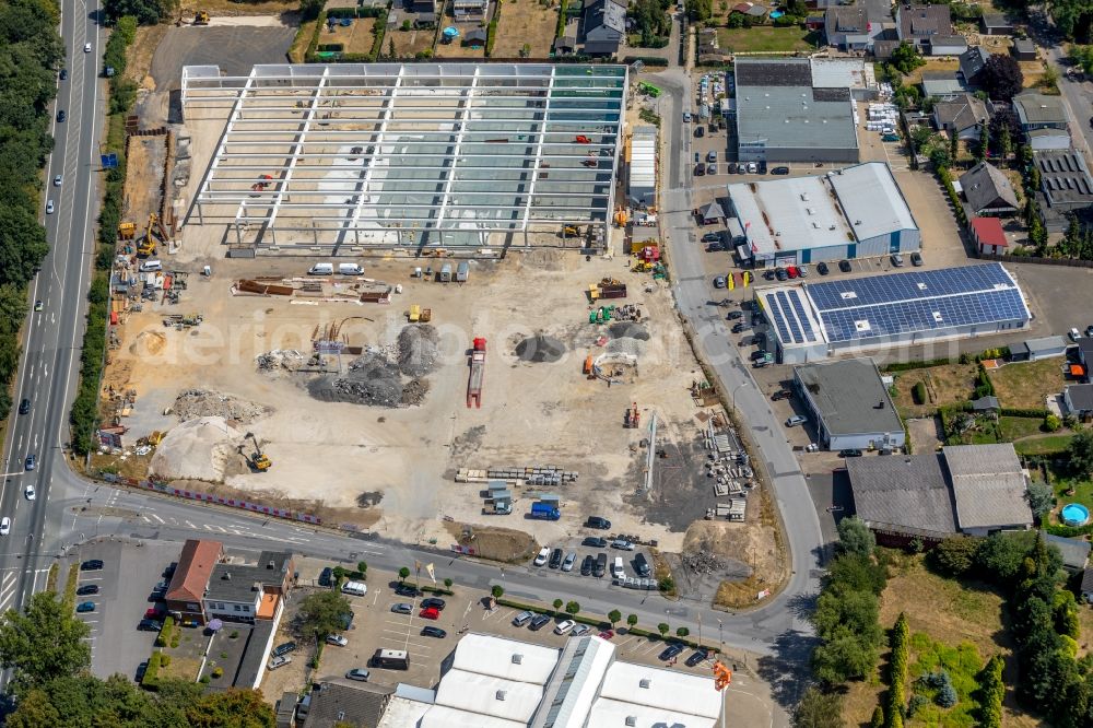 Aerial photograph Bergkamen - New construction of the building complex of the shopping center KAUFLAND between Ostenhellweg and Am Roemerlager in the district Ruenthe in Bergkamen in the state North Rhine-Westphalia, Germany