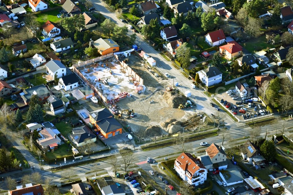 Berlin from above - New construction of the building complex of the shopping center LIDL on Raststatter Strasse corner Hultschiner Damm in the district Mahlsdorf in Berlin, Germany