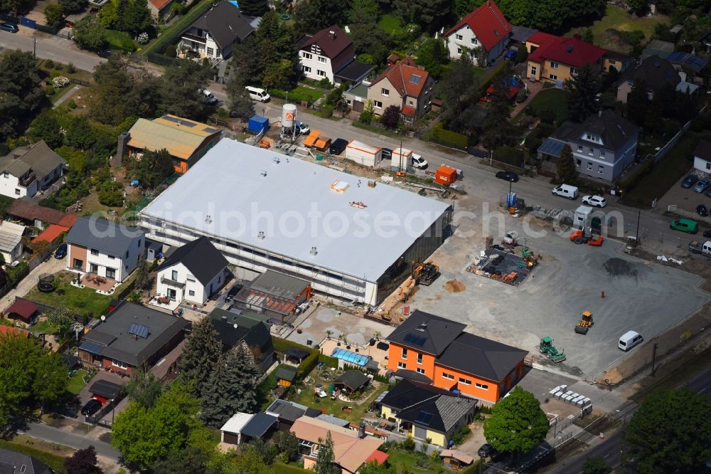 Berlin from the bird's eye view: New construction of the building complex of the shopping center LIDL on Raststatter Strasse corner Hultschiner Damm in the district Mahlsdorf in Berlin, Germany