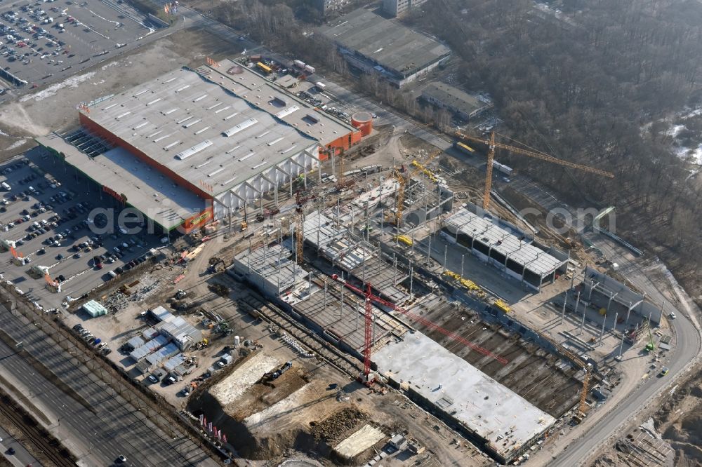 Berlin from above - New construction of the building complex of the shopping center of Hoeffner Moebelgesellschaft GmbH & Co.KG and the Krieger-Gruppe on Landsberger Allee in Berlin