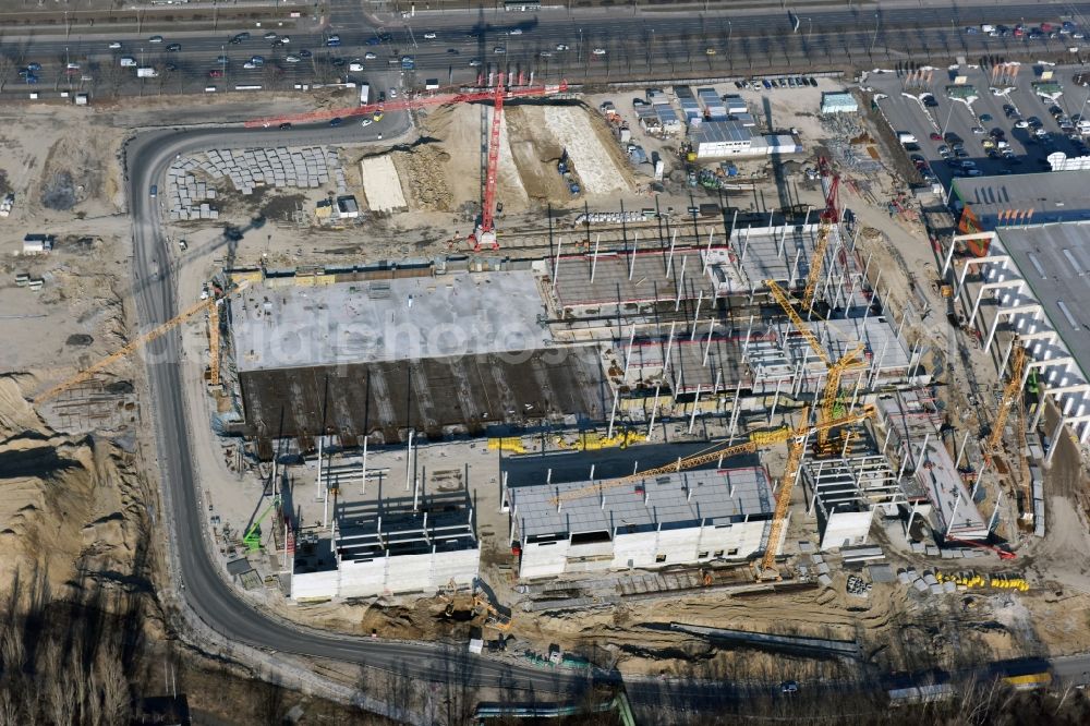 Berlin from above - New construction of the building complex of the shopping center of Hoeffner Moebelgesellschaft GmbH & Co.KG and the Krieger-Gruppe on Landsberger Allee in Berlin