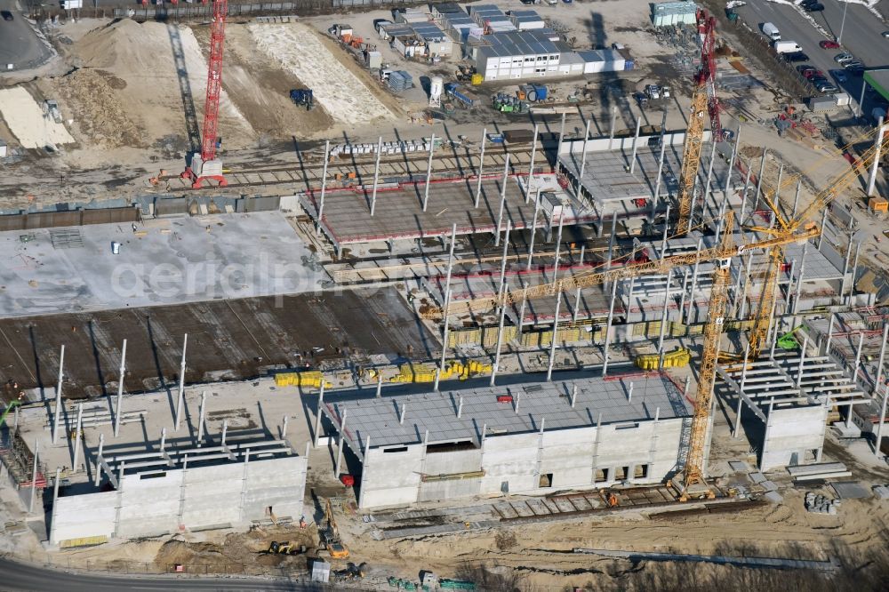 Berlin from above - New construction of the building complex of the shopping center of Hoeffner Moebelgesellschaft GmbH & Co.KG and the Krieger-Gruppe on Landsberger Allee in Berlin