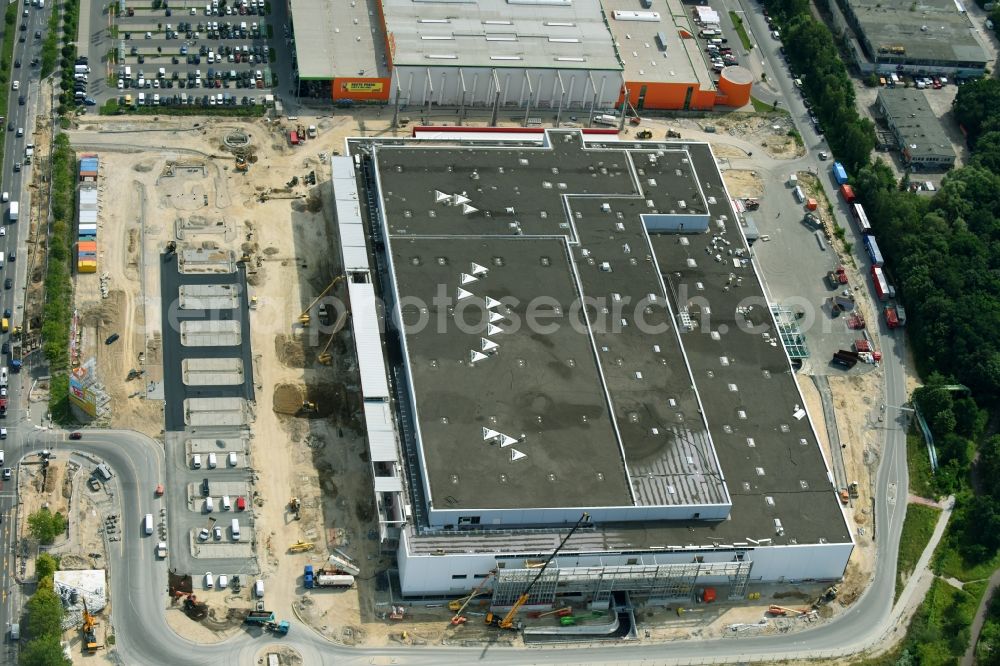 Aerial image Berlin - New construction of the building complex of the shopping center of Hoeffner Moebelgesellschaft GmbH & Co.KG and the Krieger-Gruppe on Landsberger Allee in Berlin