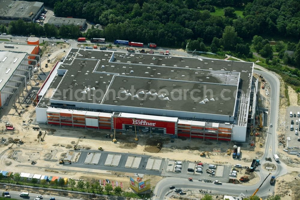 Berlin from the bird's eye view: New construction of the building complex of the shopping center of Hoeffner Moebelgesellschaft GmbH & Co.KG and the Krieger-Gruppe on Landsberger Allee in Berlin