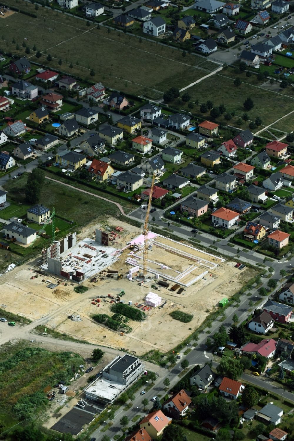 Aerial photograph Berlin - New construction of the building complex of the shopping center Mohrenfalterweg - Habichtshorst in Berlin