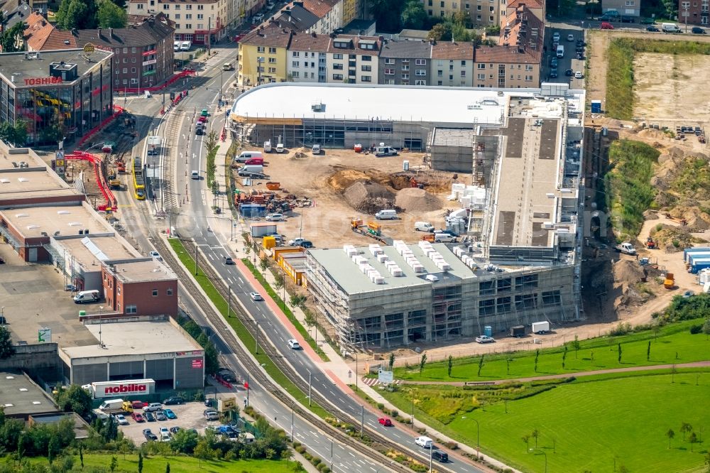 Essen from the bird's eye view: New construction of the building complex of the shopping center Quartier West of Dipl. Ing. Josef Schoofs Immobilien GmbH on Altendorfer Strasse in Essen in the state North Rhine-Westphalia