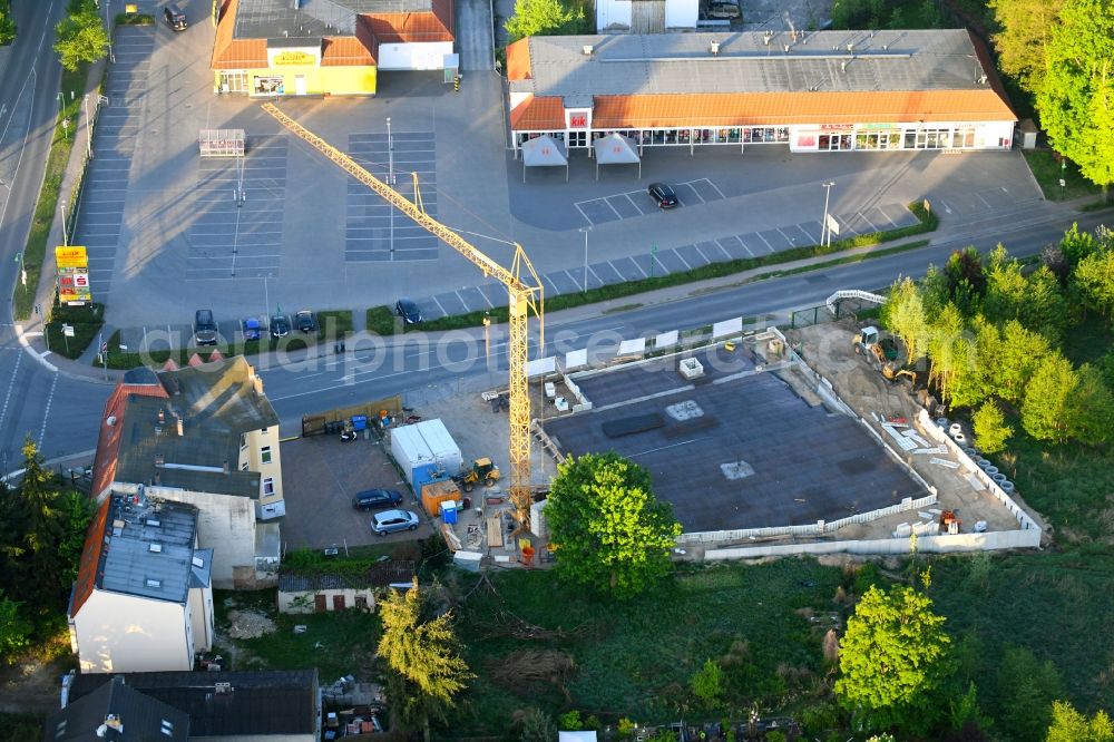 Werneuchen from the bird's eye view: New construction of the building complex of the shopping center einer Rossmann-Filiale on Schulstrasse in Werneuchen in the state Brandenburg, Germany