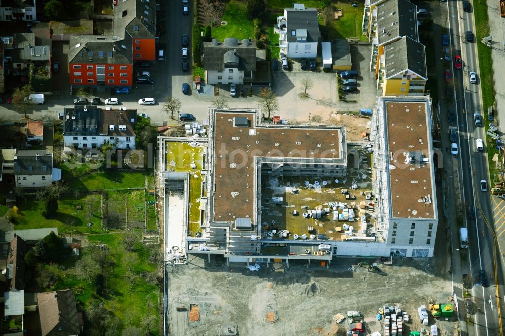 Aerial photograph Aschaffenburg - New construction of the building complex of the shopping center Tegut-Markt on Schillerstrasse corner Muellerstrasse in the district Damm in Aschaffenburg in the state Bavaria, Germany