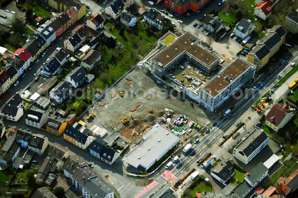 Aschaffenburg from the bird's eye view: New construction of the building complex of the shopping center Tegut-Markt on Schillerstrasse corner Muellerstrasse in the district Damm in Aschaffenburg in the state Bavaria, Germany