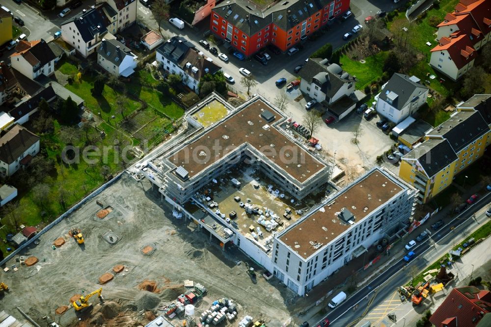 Aerial image Aschaffenburg - New construction of the building complex of the shopping center Tegut-Markt on Schillerstrasse corner Muellerstrasse in the district Damm in Aschaffenburg in the state Bavaria, Germany